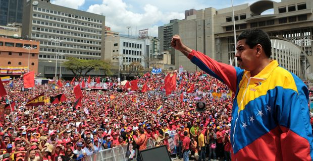 ORG XMIT: MSN005 Handout picture released by the Venezuelan Presidency showing Venezuela acting President Nicolas Maduro (R) delivering a speech after registering his candidacy for the upcoming presidential election at the National Electoral Council (SNE), in Caracas, on March 11, 2013. Venezuela has entered a bitter election race to succeed Hugo Chavez, with his chosen successor branding his challenger a "fascist" after the opposition candidate accused him of exploiting the late leader's death.  AFP PHOTO/PRESIDENCIA/MARCELO GARCIA/HO   --- RESTRICTED TO EDITORIAL USE - MANDATORY CREDIT "AFP PHOTO/PRESIDENCIA/HO" - NO MARKETING NO ADVERTISING CAMPAIGNS - DISTRIBUTED AS A SERVICE TO CLIENTS