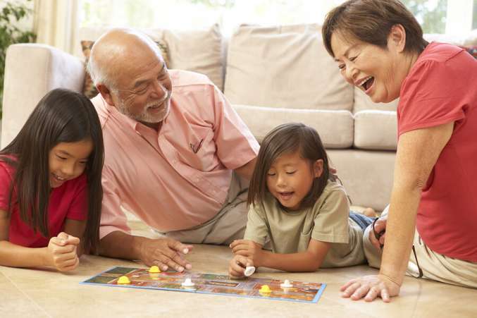 grandparents_grandkids_playing_board_game_H