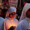 Indian Christians and social activists take part in a peace-rally and protest against the rape of a nun in Allahabad on March 16, 2015. Hundreds of priests, school girls and other protesters staged a peaceful rally March 16, 2015 in the Indian city of Kolkata to support an elderly nun who was gang-raped at her convent school. Nuns dressed in white habits joined other women of all backgrounds and ages, including girls still in their uniforms, to express their sorrow over the attack and anger over incessant levels of sexual assault in India. AFP PHOTO/ SANJAY KANOJIA        (Photo credit should read Sanjay Kanojia/AFP/Getty Images)